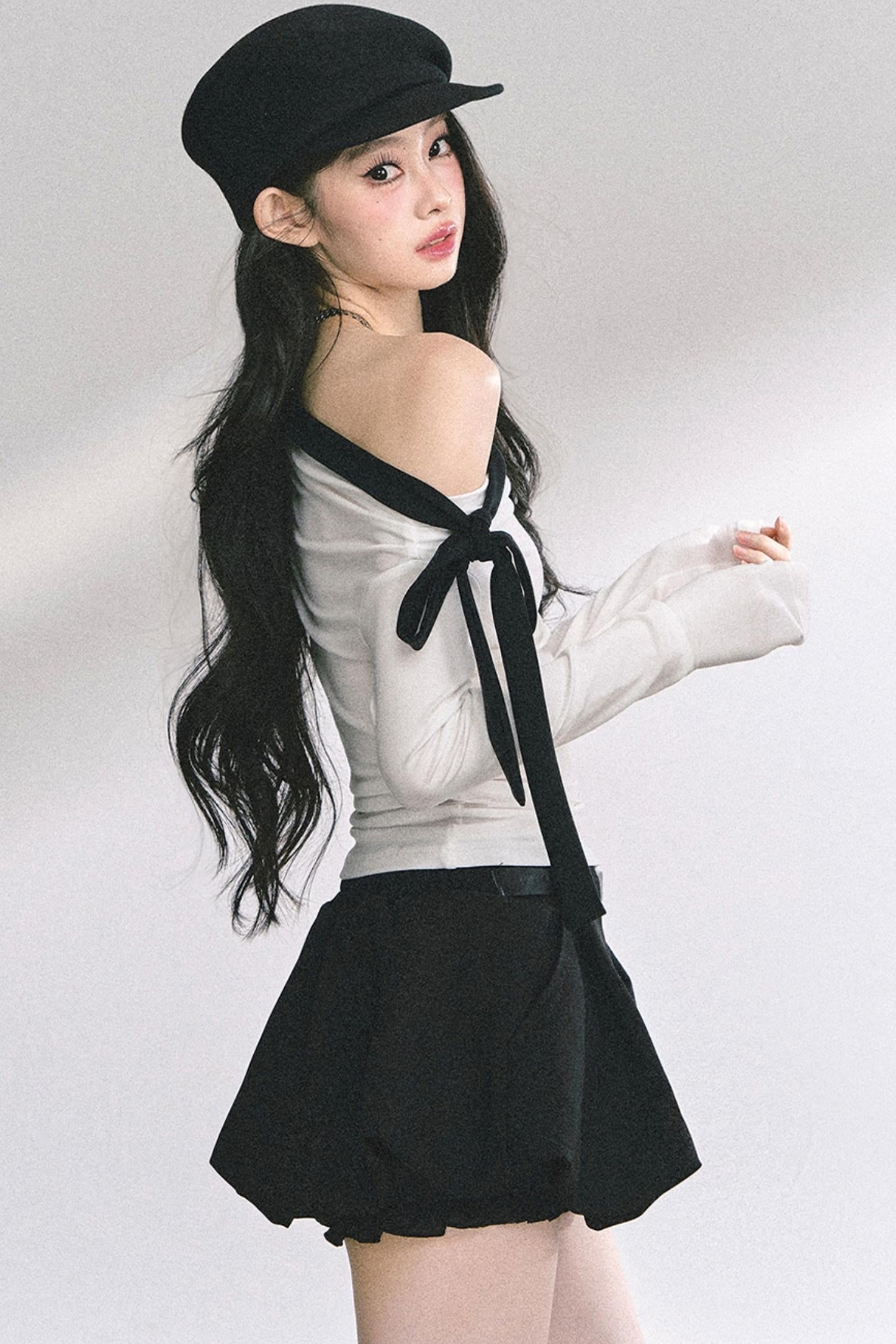 Swirl Waist Slimming Black Top