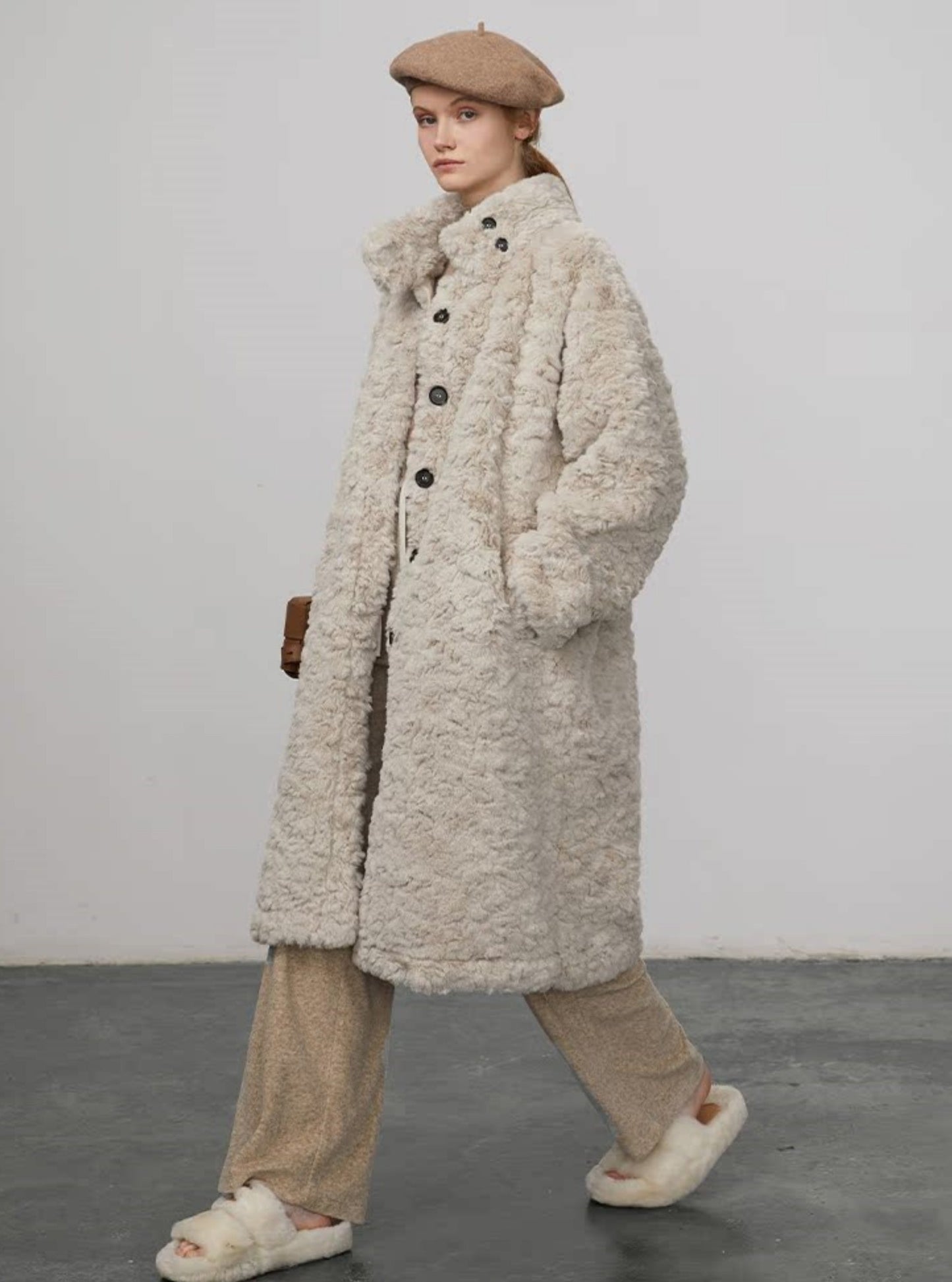 Thick mid length fur integrated coat