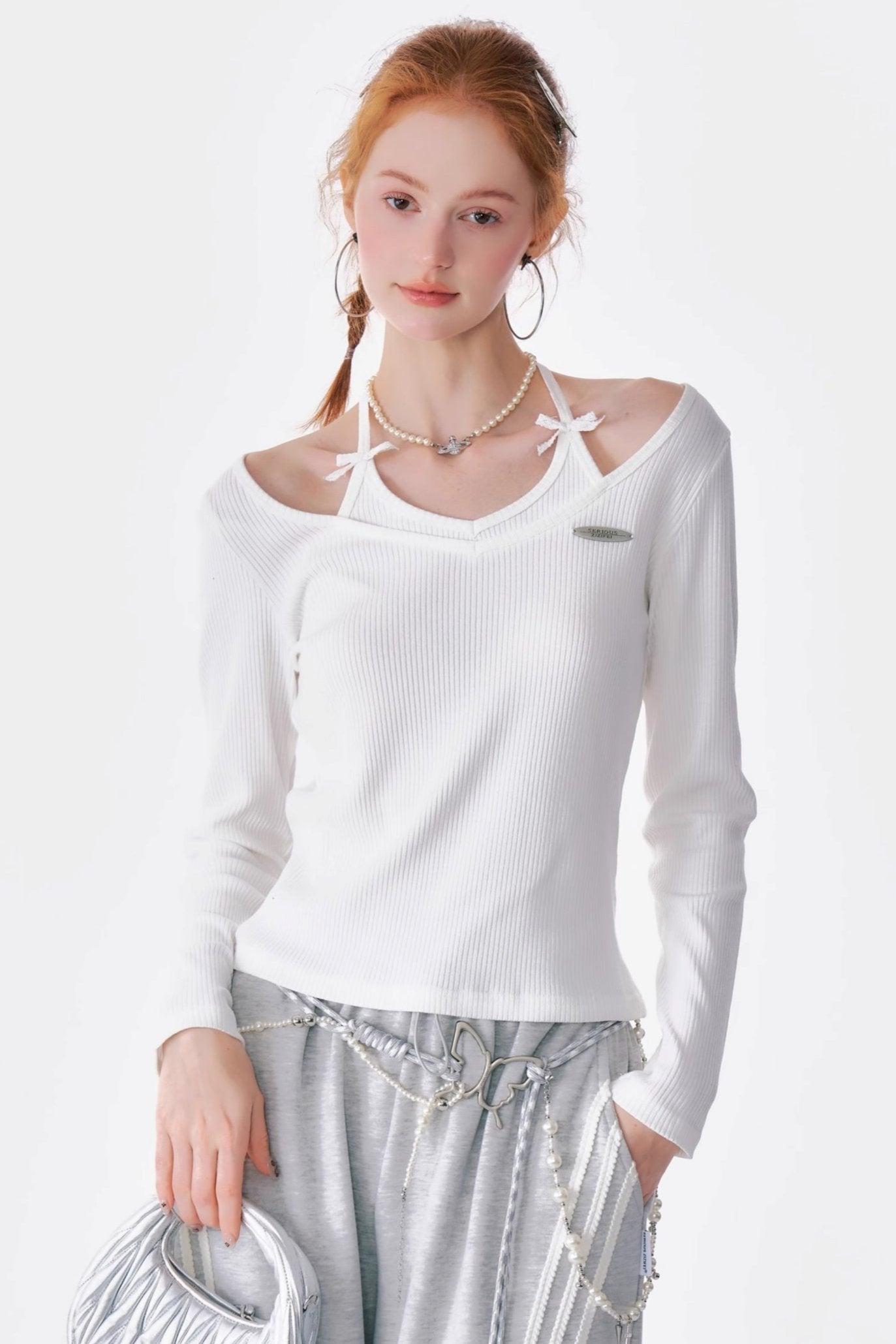 BOW HALTERNECK KNITTED LONG SLEEVE TOP