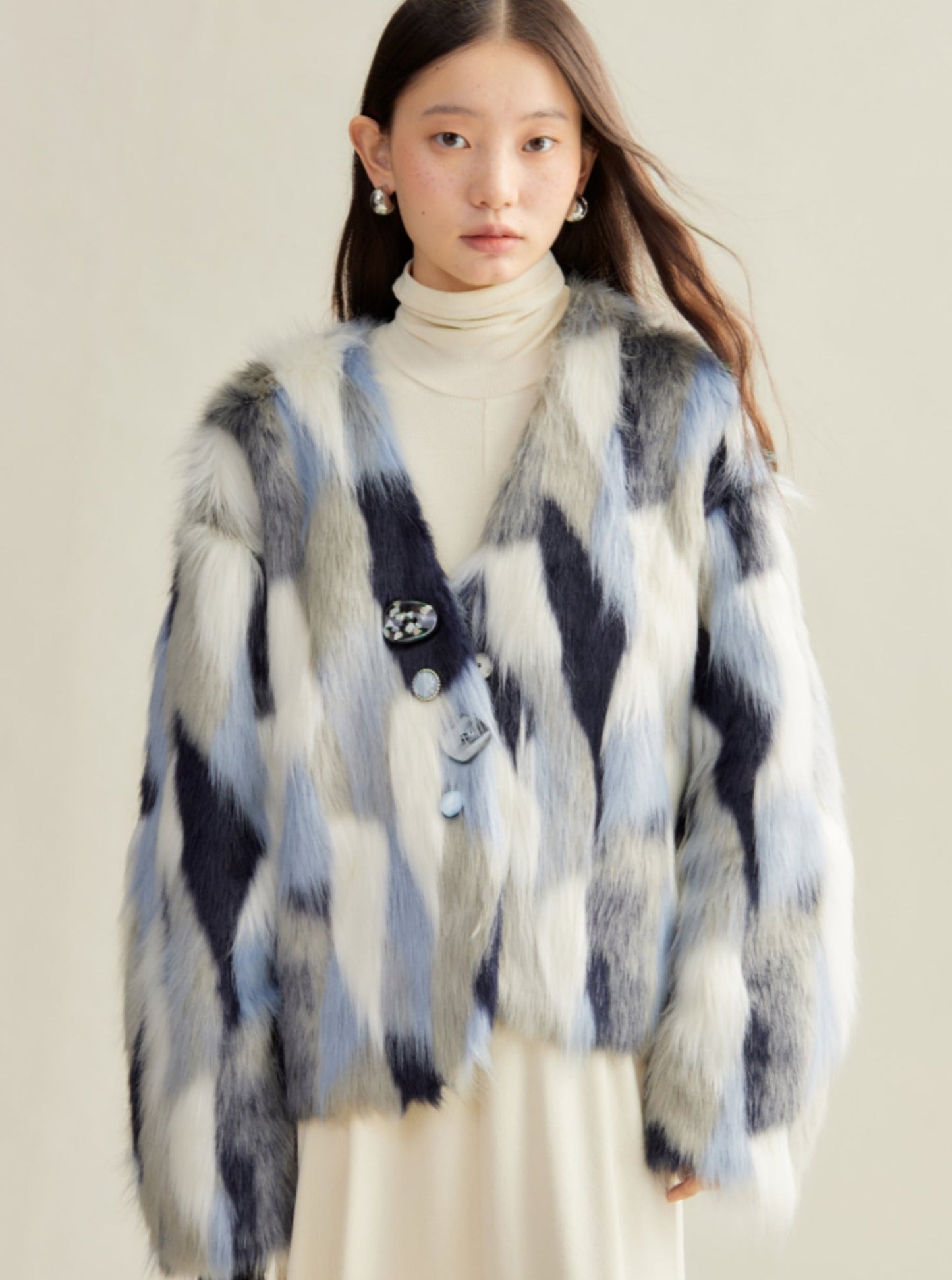 blond loose cropped fur coat