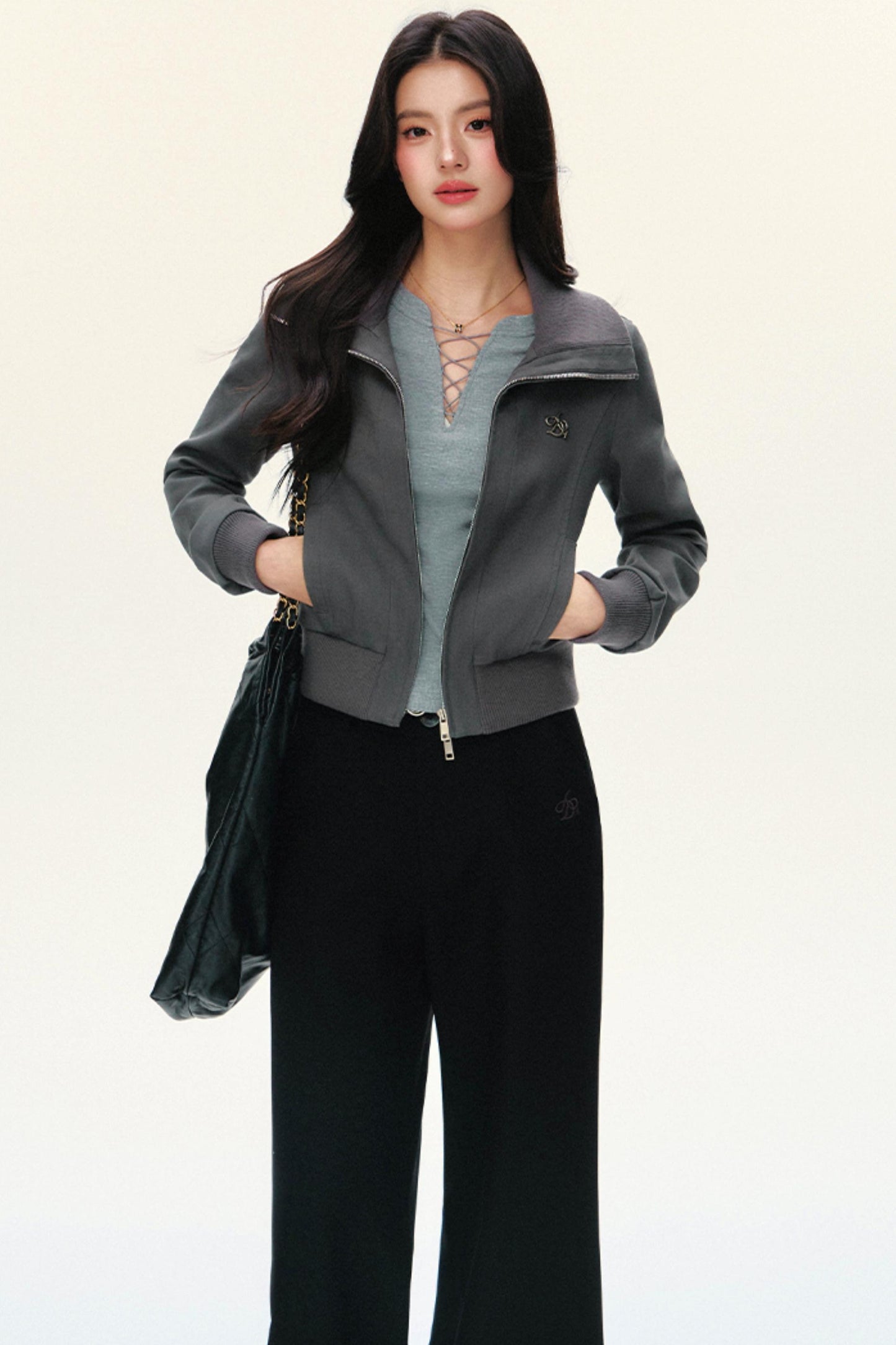 Veste courte slim paresseuse à manches courtes cousue 