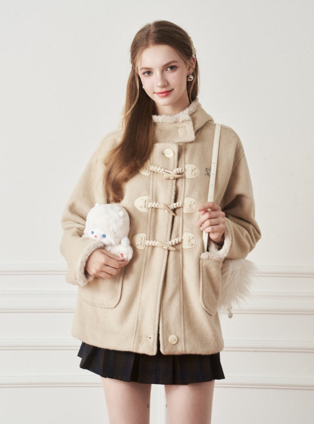 Woolen rough-edged horn-buttoned coat