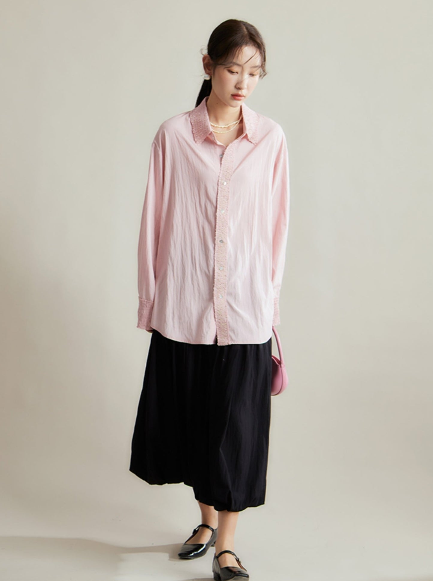 loose long-sleeved shirt