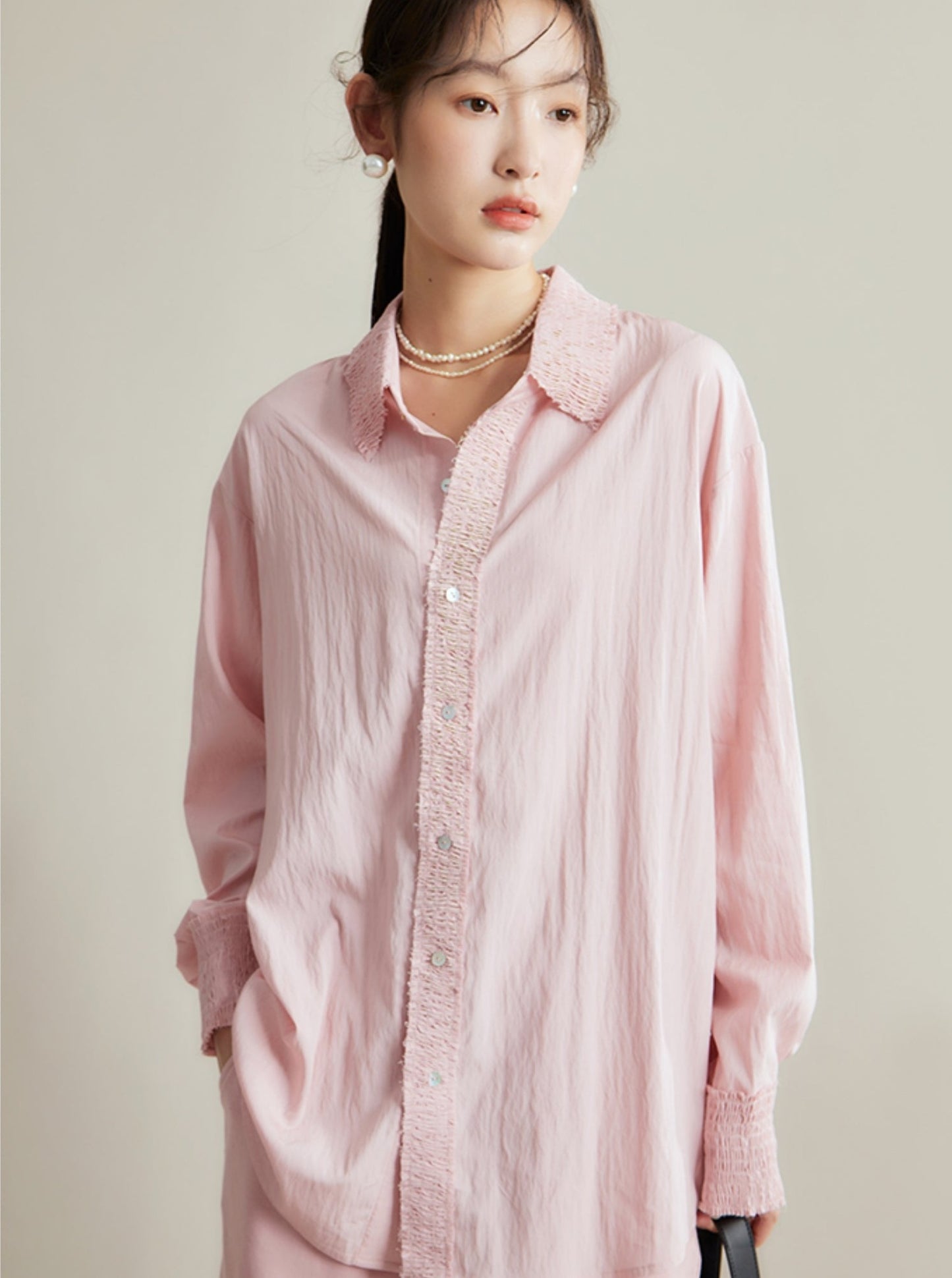 loose long-sleeved shirt