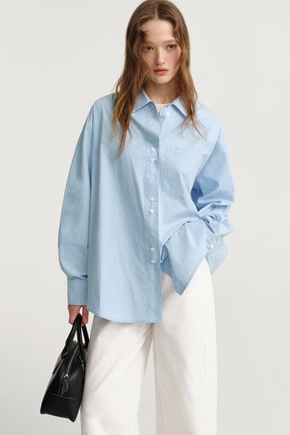 DESIGNER PLUS: FRENCH BLUE LONG-SLEEVED SHIRT FOR PRE-FALL FASHION, WORN OVER AND UNDERNEATH, WITH A COTTON SHIRT SILHOUETTE