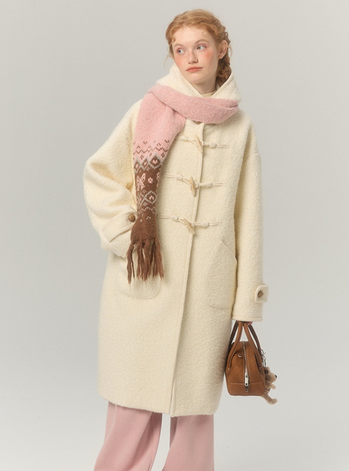 Long thicked hooded horn-buttoned tweed coat