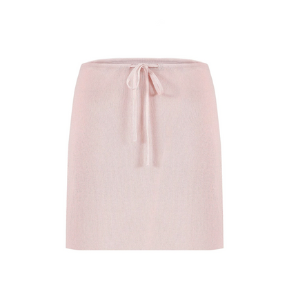 Completo a maglia dalla vestibilità rilassata con cardigan smanicato e gonna