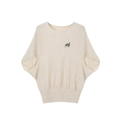 Completo top in maglia, gonna e catena