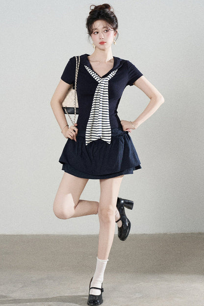 Ensemble tee-shirt châle à manches courtes en maille bleu marine et jupe