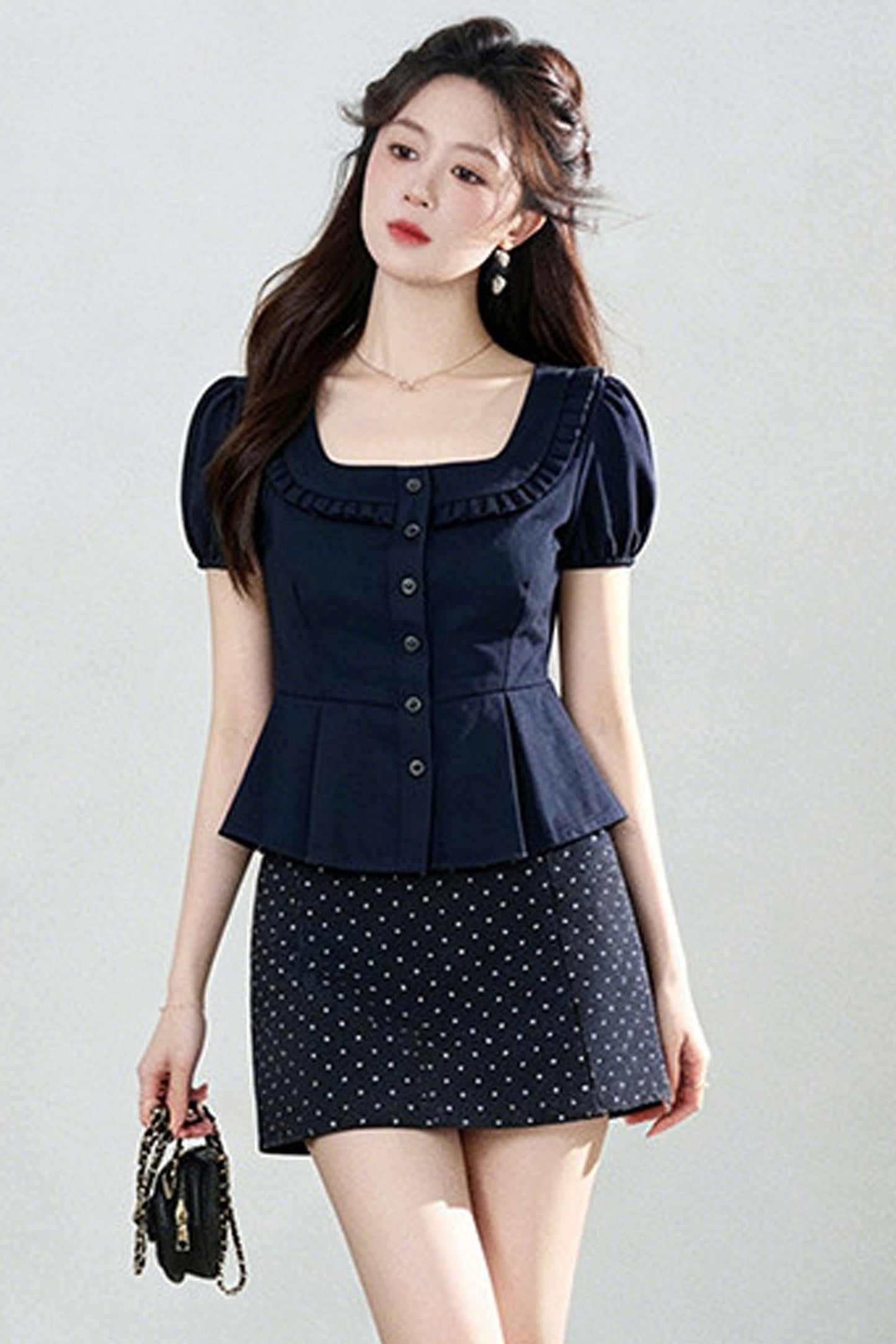 Ensemble chemise à manches courtes et jupe à pois