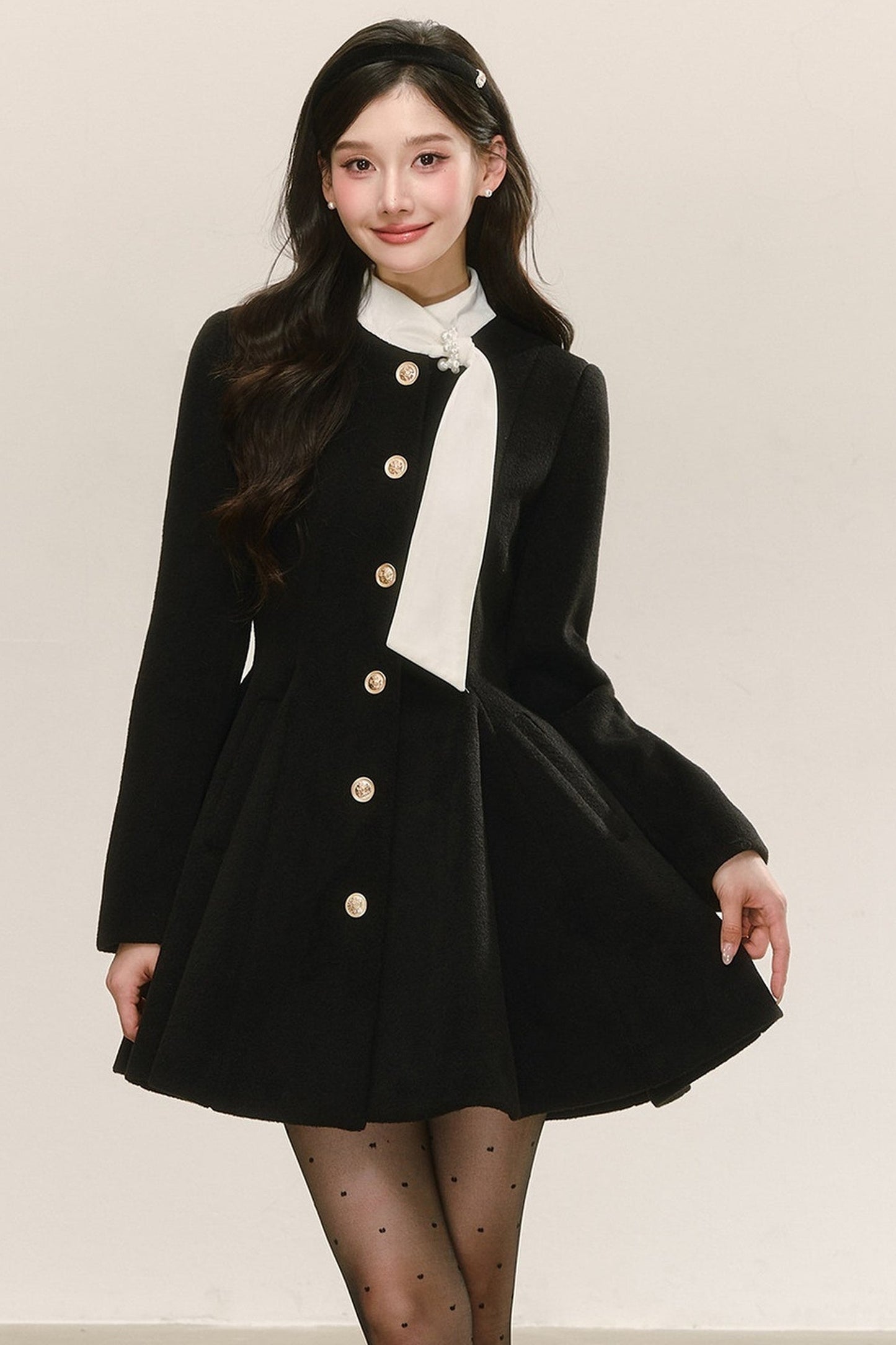 Abito cappotto imbottito in lana nero
