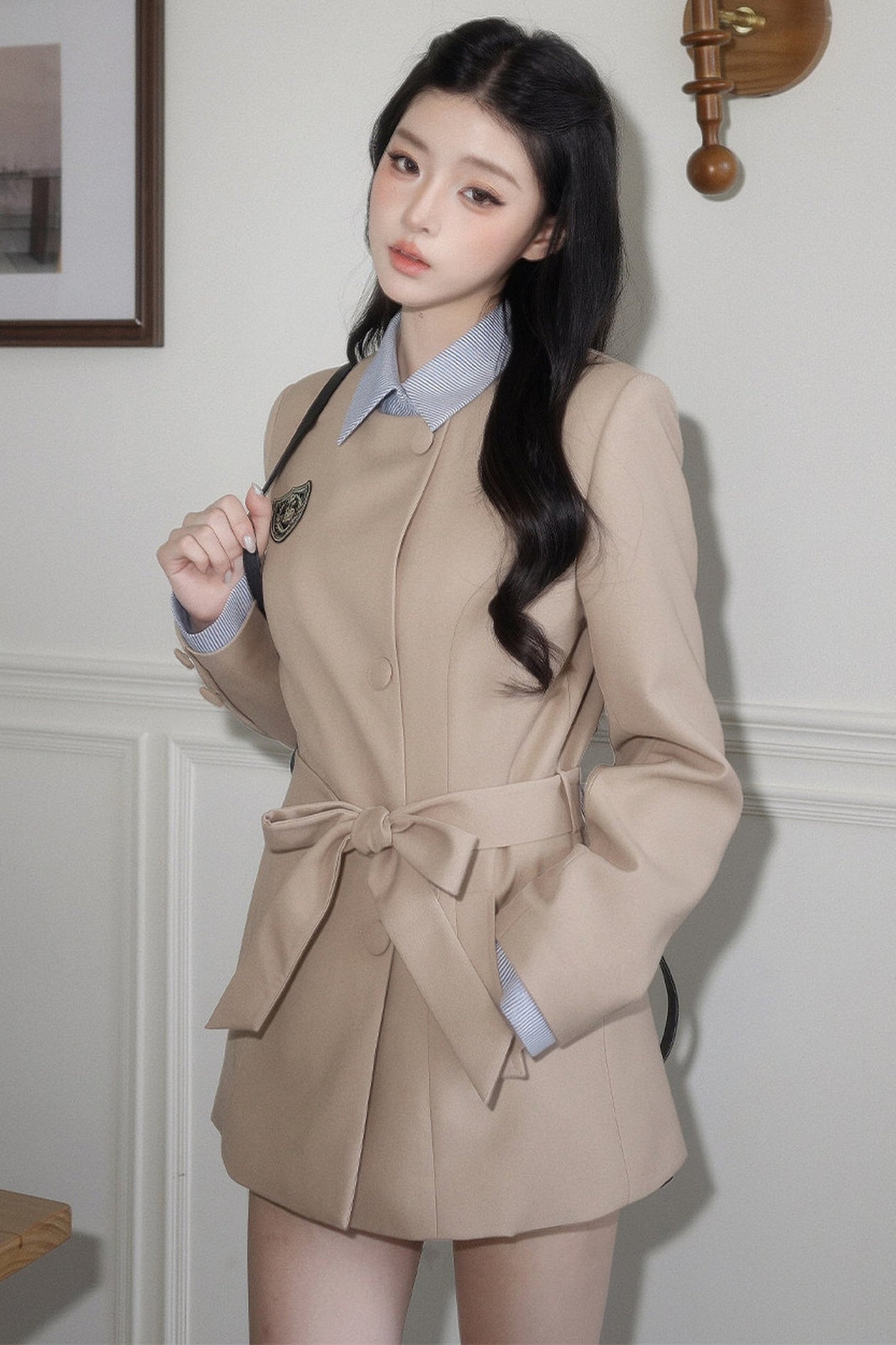 Blazer à nœud cintrant la taille