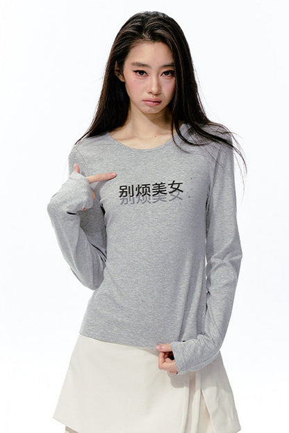 Tee-shirt à manches longues en maille avec imprimé strass
