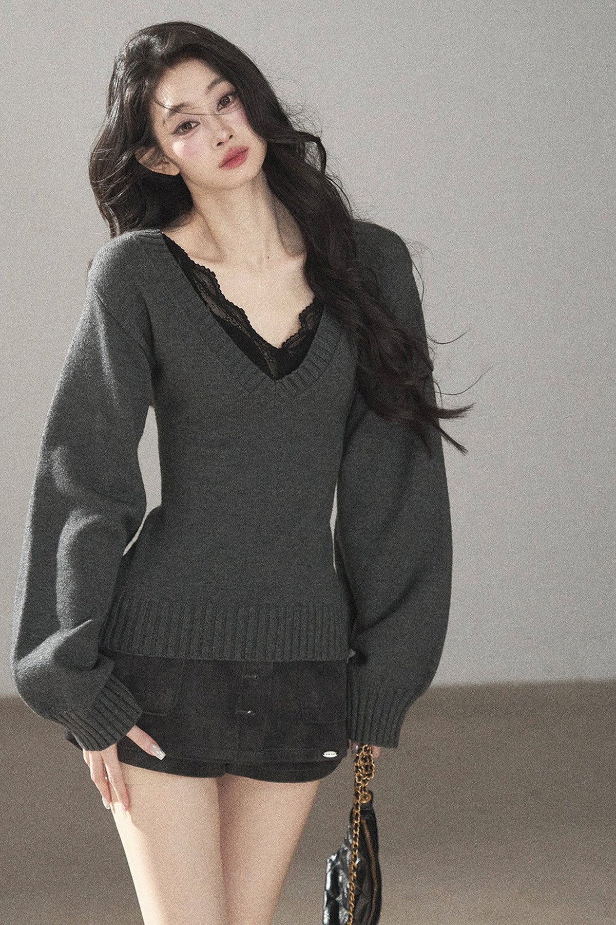 Top a maglia con scollo a V e maniche lunghe