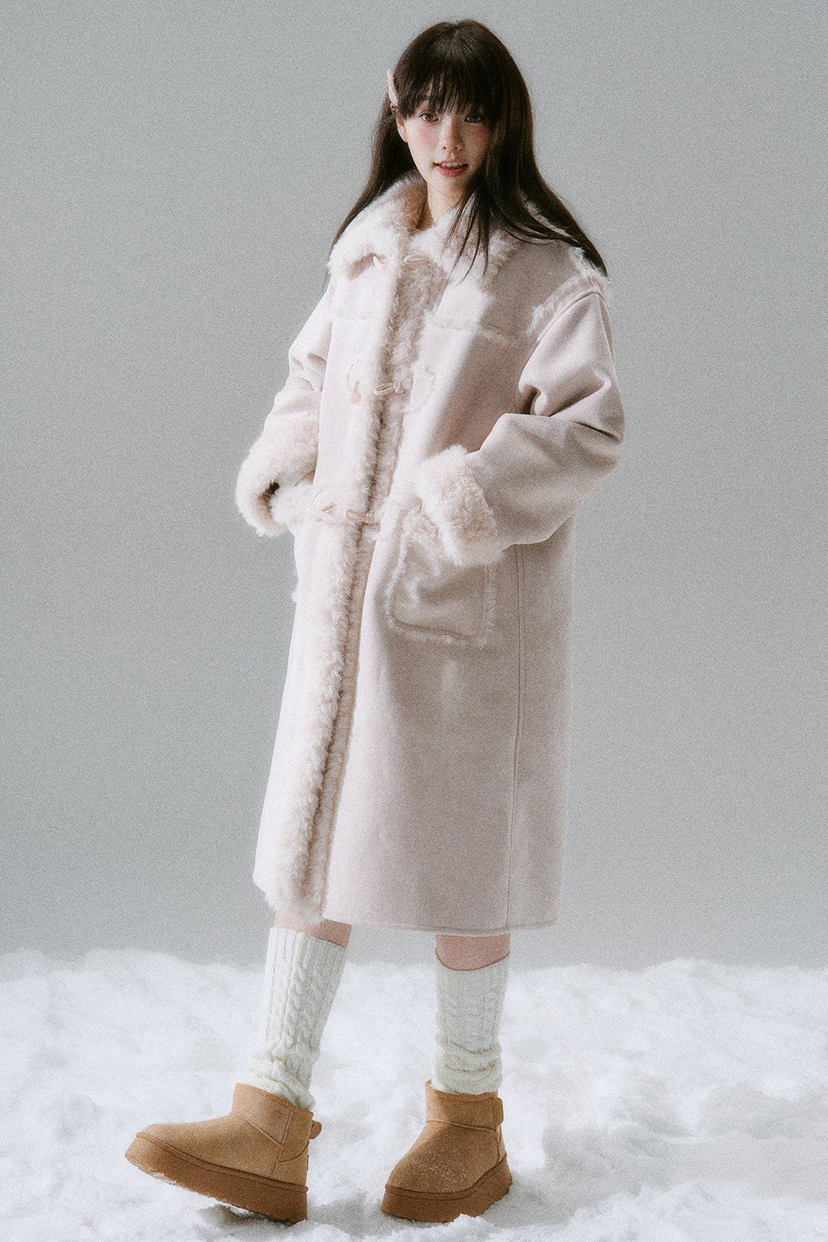 Manteau long à boutons en corne