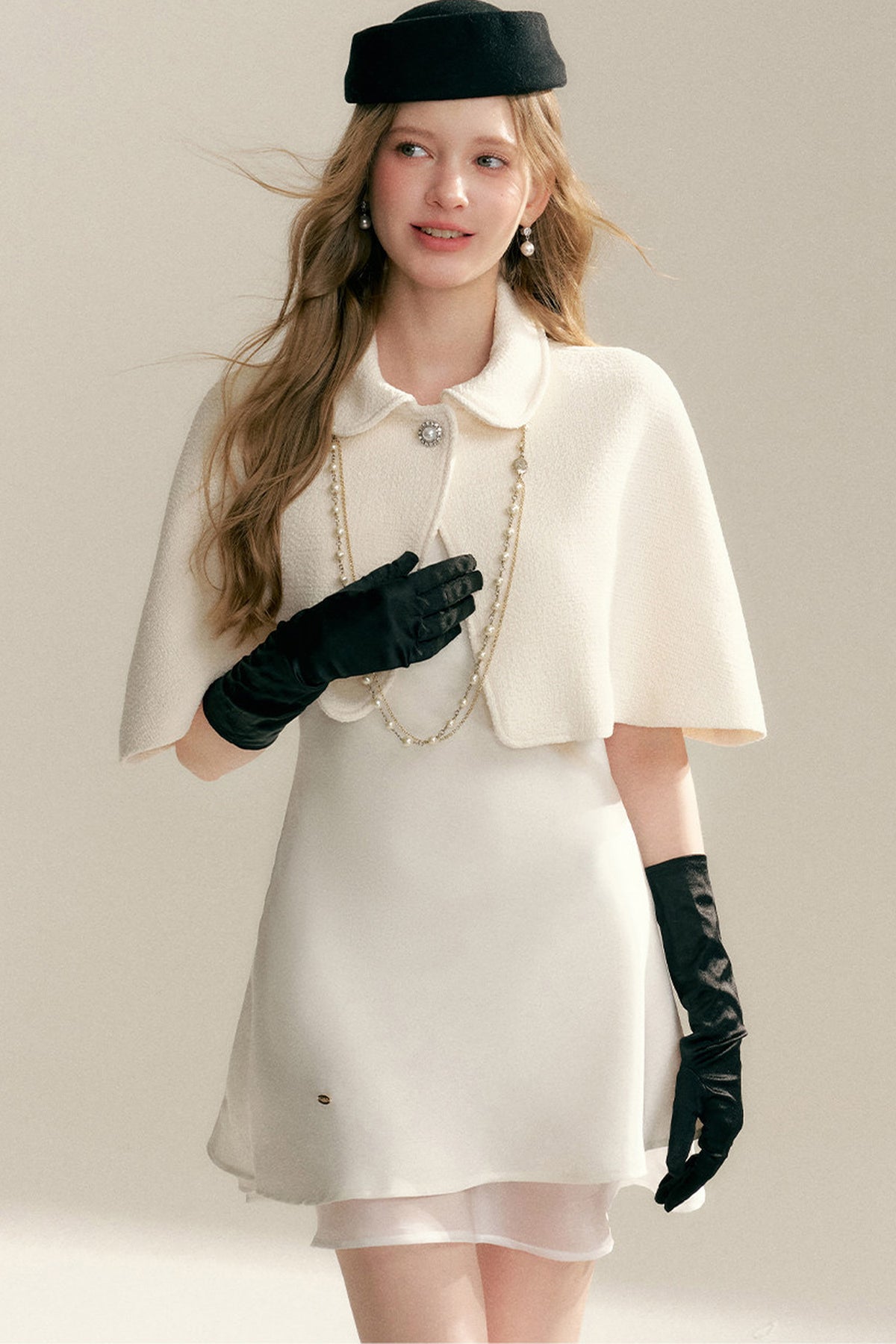 Off-White Sleeveless Cape