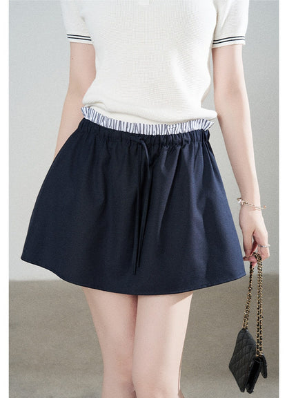 Ensemble tee-shirt polo en tricot blanc à manches courtes et jupe