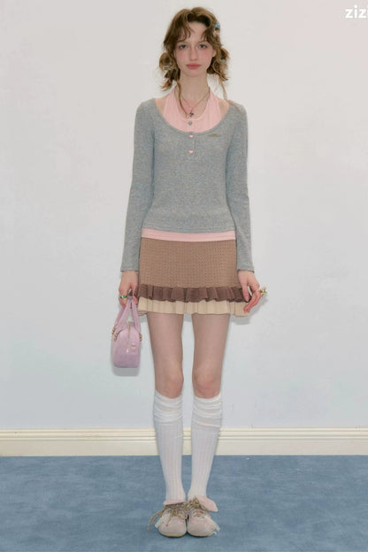 Graues langärmeliges Neckholder-Strickoberteil