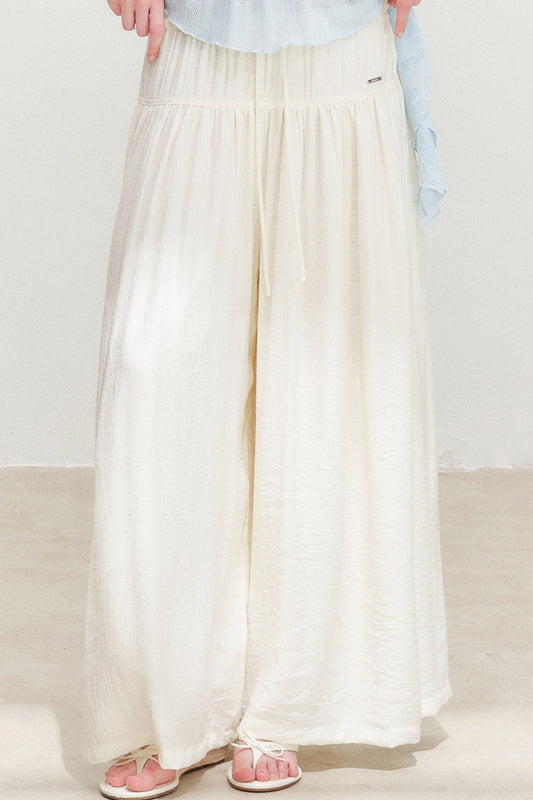 Pantalon taille haute à volants