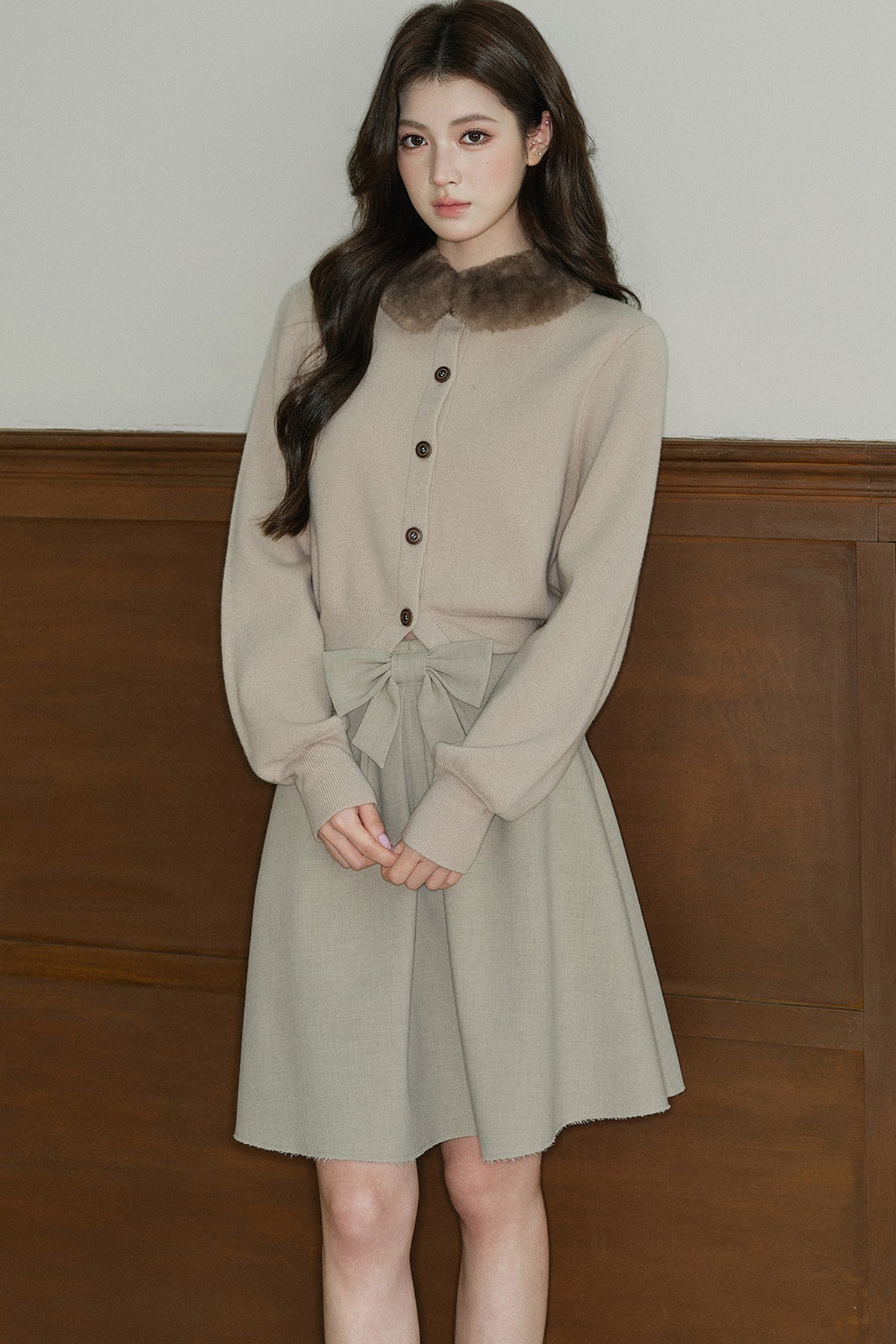 Cardigan en maille à col en fourrure contrastante