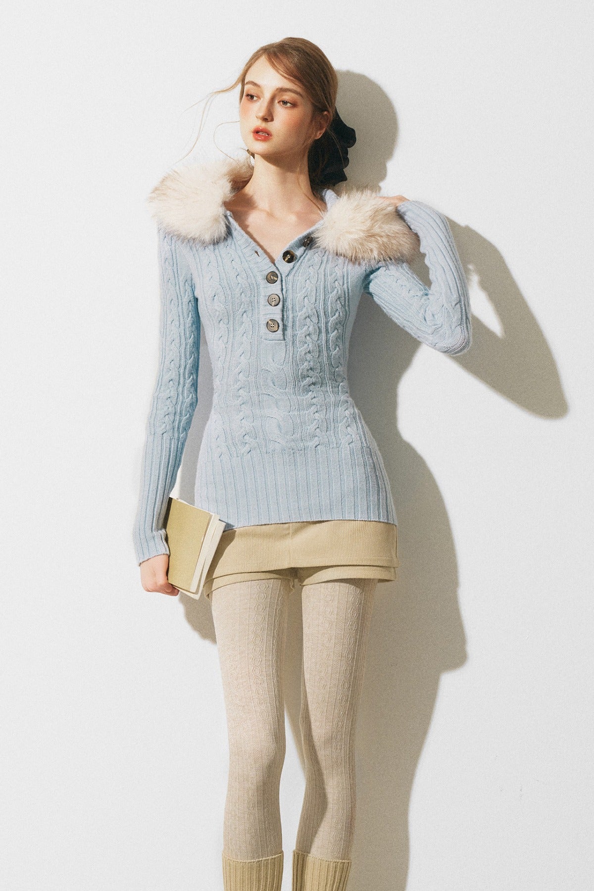 Zopfstrickpullover mit Pelzbesatz