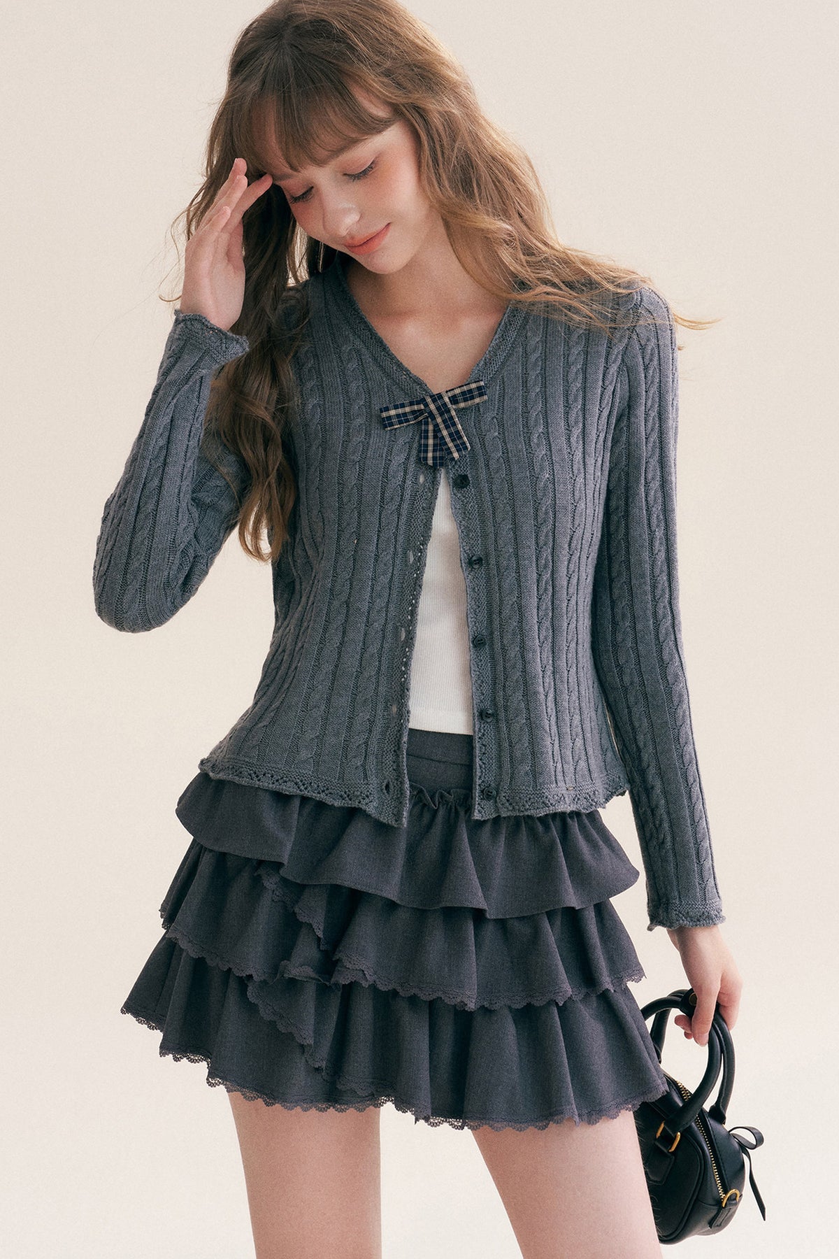 Cardigan à col en V à carreaux avec nœud