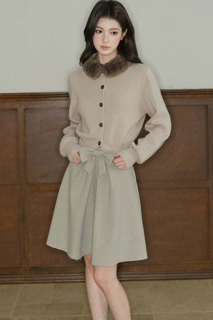 Cardigan en maille à col en fourrure contrastante