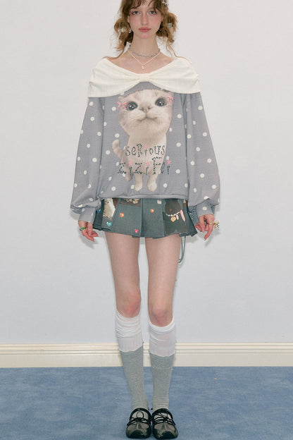 Sudadera gris con estampado de gato y lunares