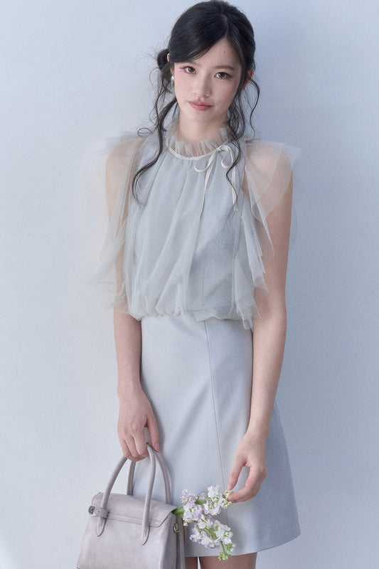 Robe plissée en résille à empiècements
