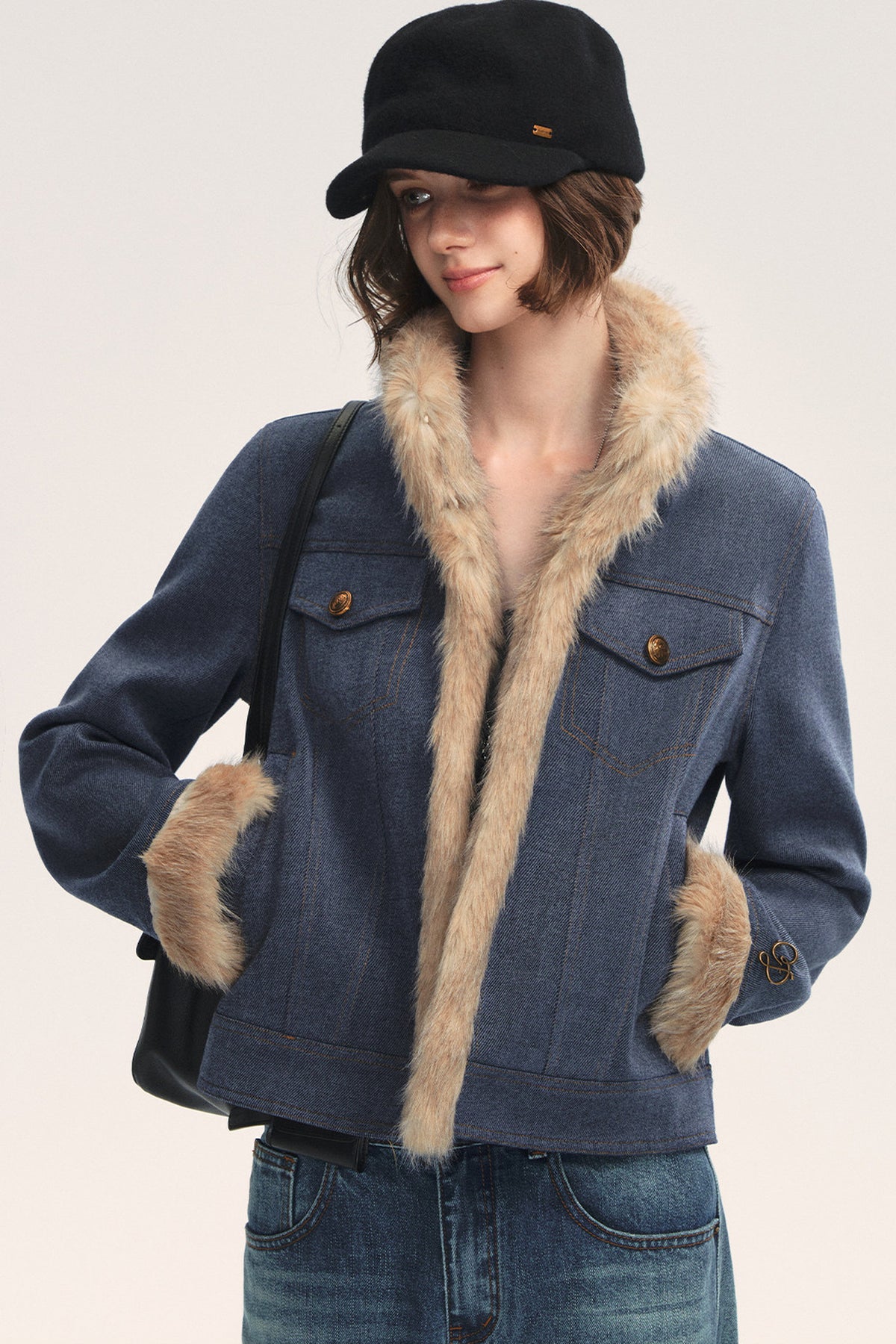 Jeansblaue Patchwork-Jacke mit Fellrevers