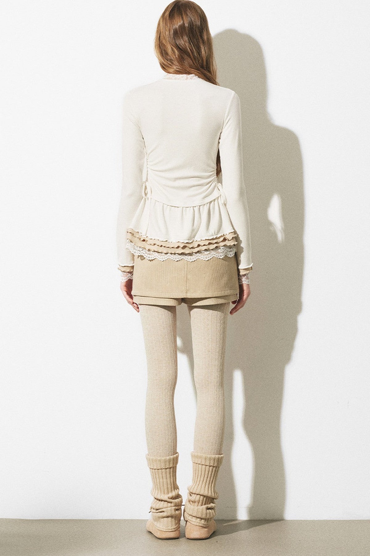 Top a maglia slim fit con bordo in pizzo