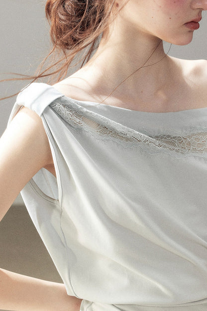 Maglietta corta in pizzo con spalle scoperte