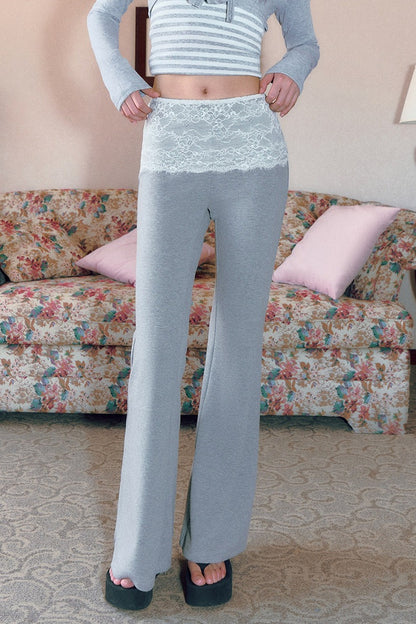 Pantaloni svasati a vita bassa grigi con inserti in pizzo