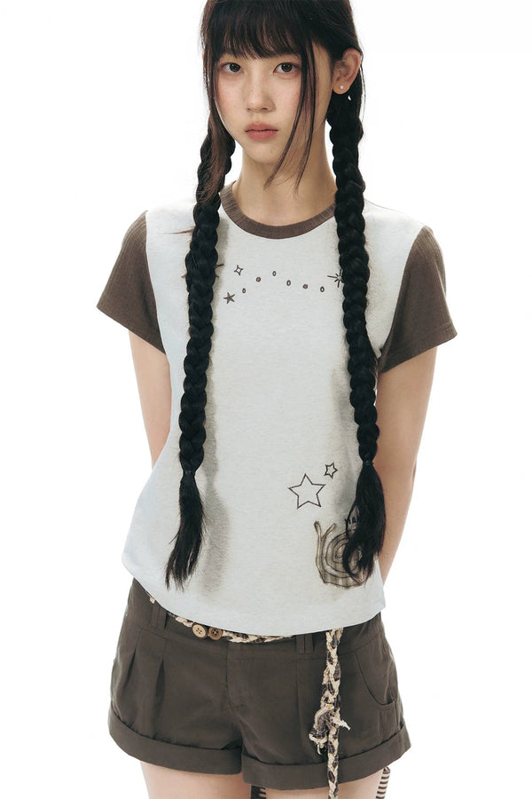 Camiseta de punto con bloques de color y parche de caracol