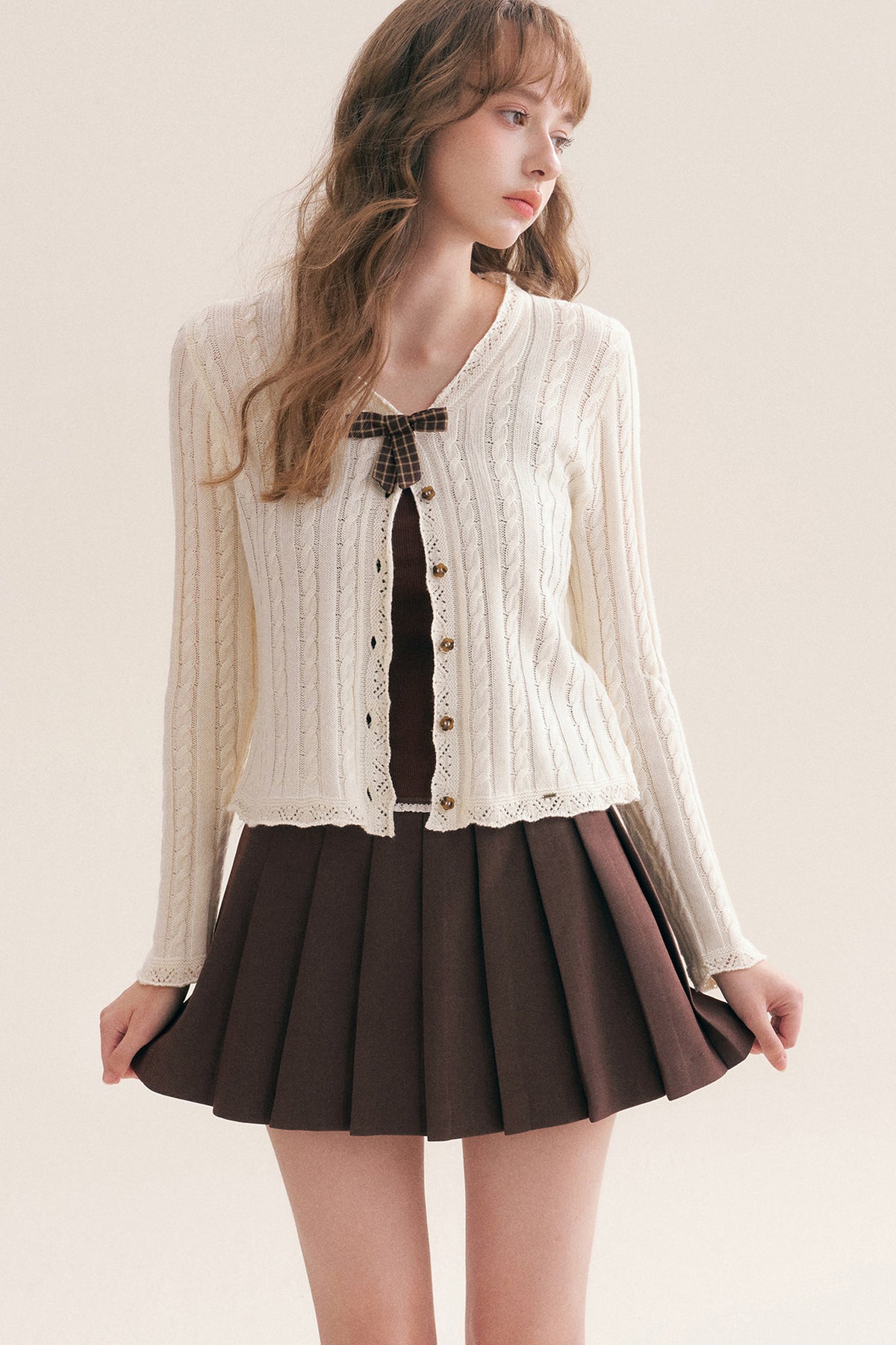 Cardigan à col en V à carreaux avec nœud