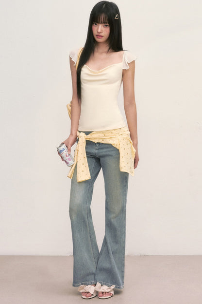 Top con cuello drapeado y mangas con volantes
