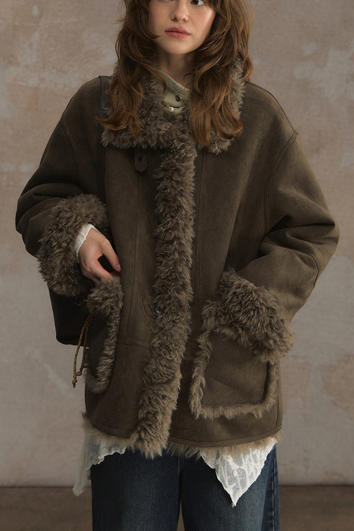 Wendbare flauschige Lammwolljacke