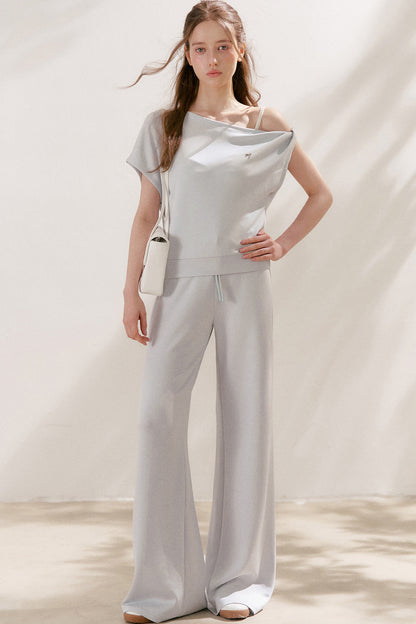 Conjunto de camiseta asimétrica y pantalones de capa de aire
