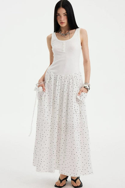Vestido maxi evasé sin mangas de lunares