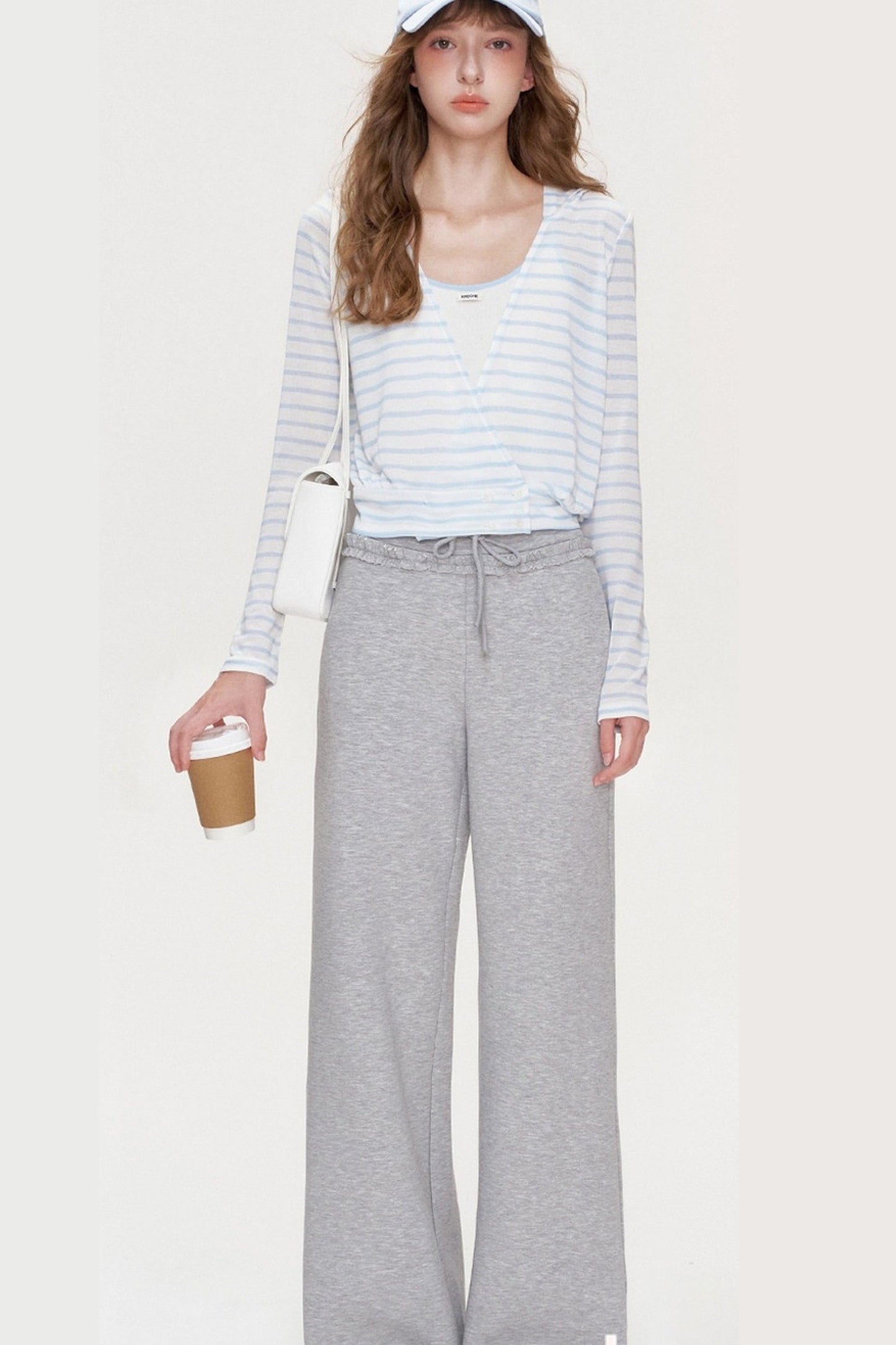 T-shirt a righe a maniche lunghe con scollo a V incrociato