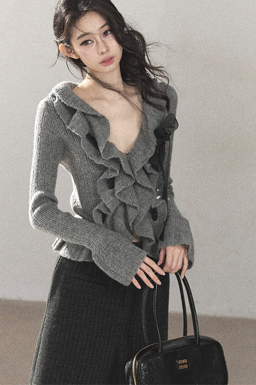 Pull court en maille à volants
