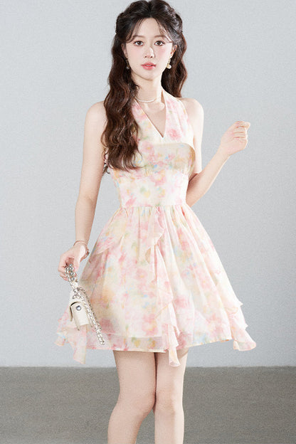 Abito a volant con scollo a V e allacciatura al collo in chiffon floreale