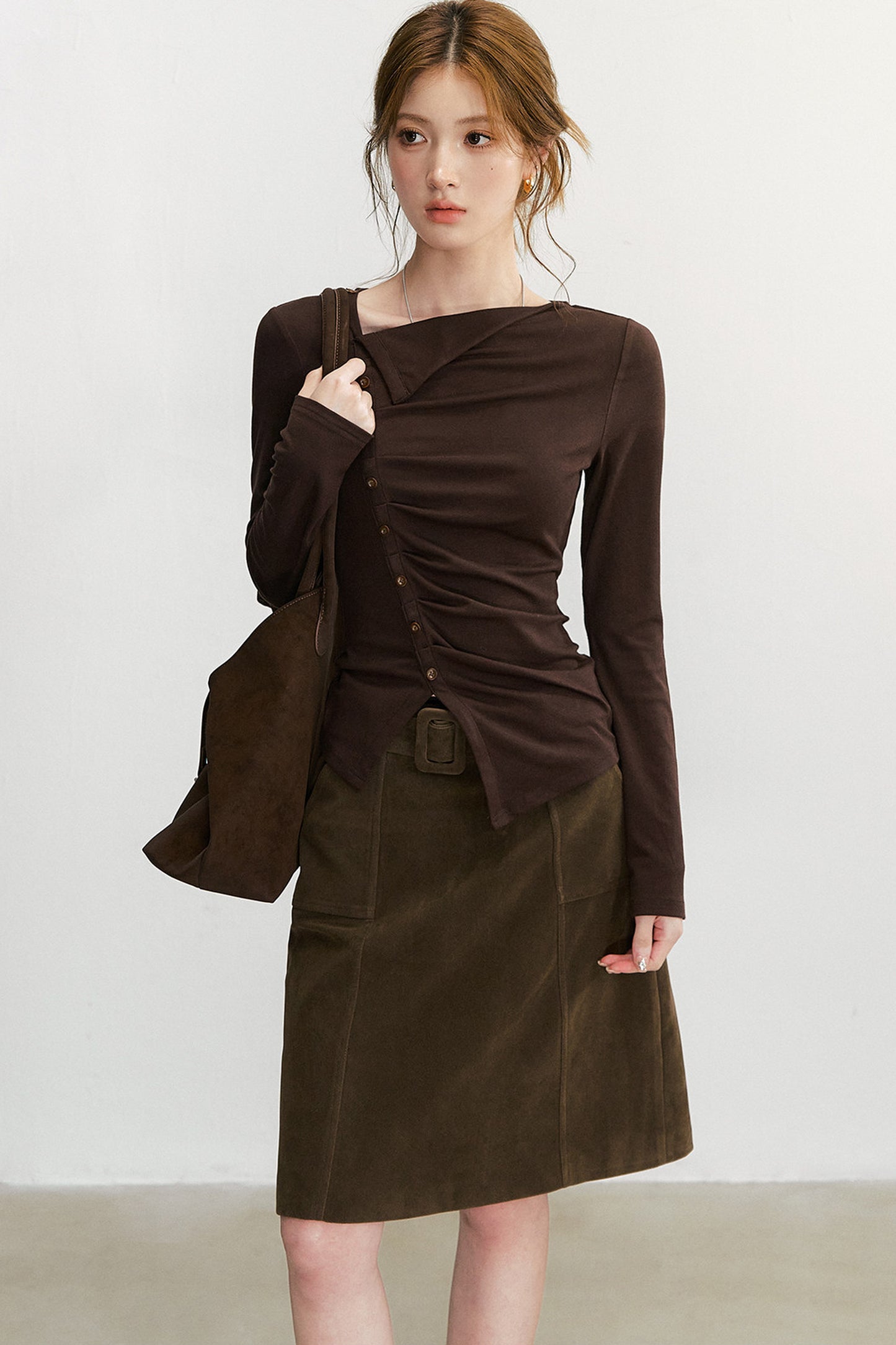 Asymmetrisches langärmeliges Strickoberteil