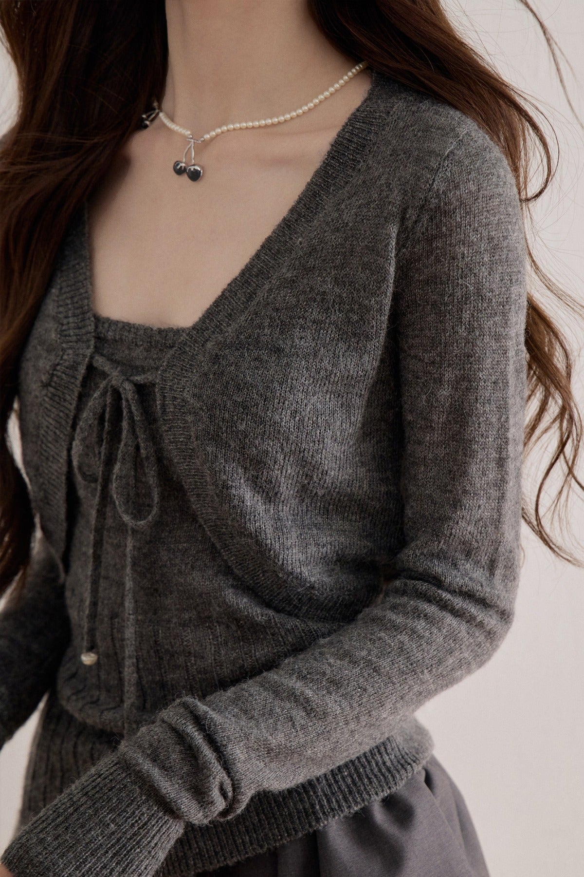 Long-Sleeve V-Neck Lace-Up Knit Sweater