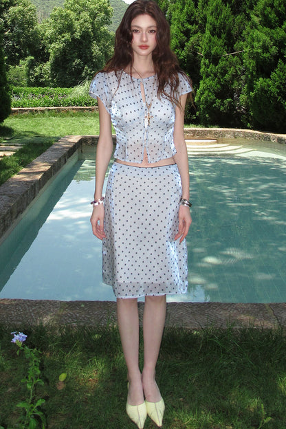 Completo con top e gonna blu acqua a pois e floreale