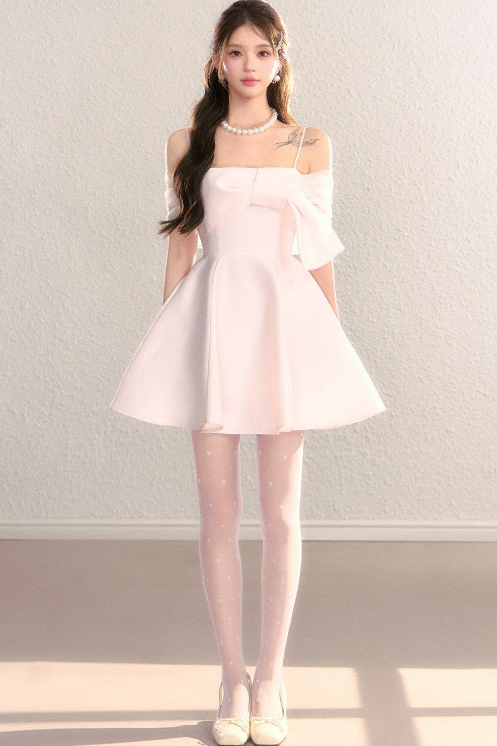 Abito da sera in tulle con spalle scoperte