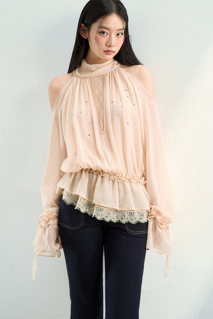 Blusa in tessuto velato e rete con strass
