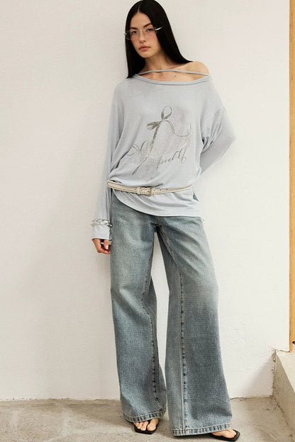 Top con strass effetto distressed con spalle scoperte