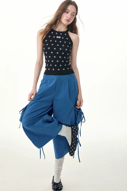 Top all’americana in maglia nero a pois