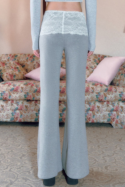 Pantaloni svasati a vita bassa grigi con inserti in pizzo